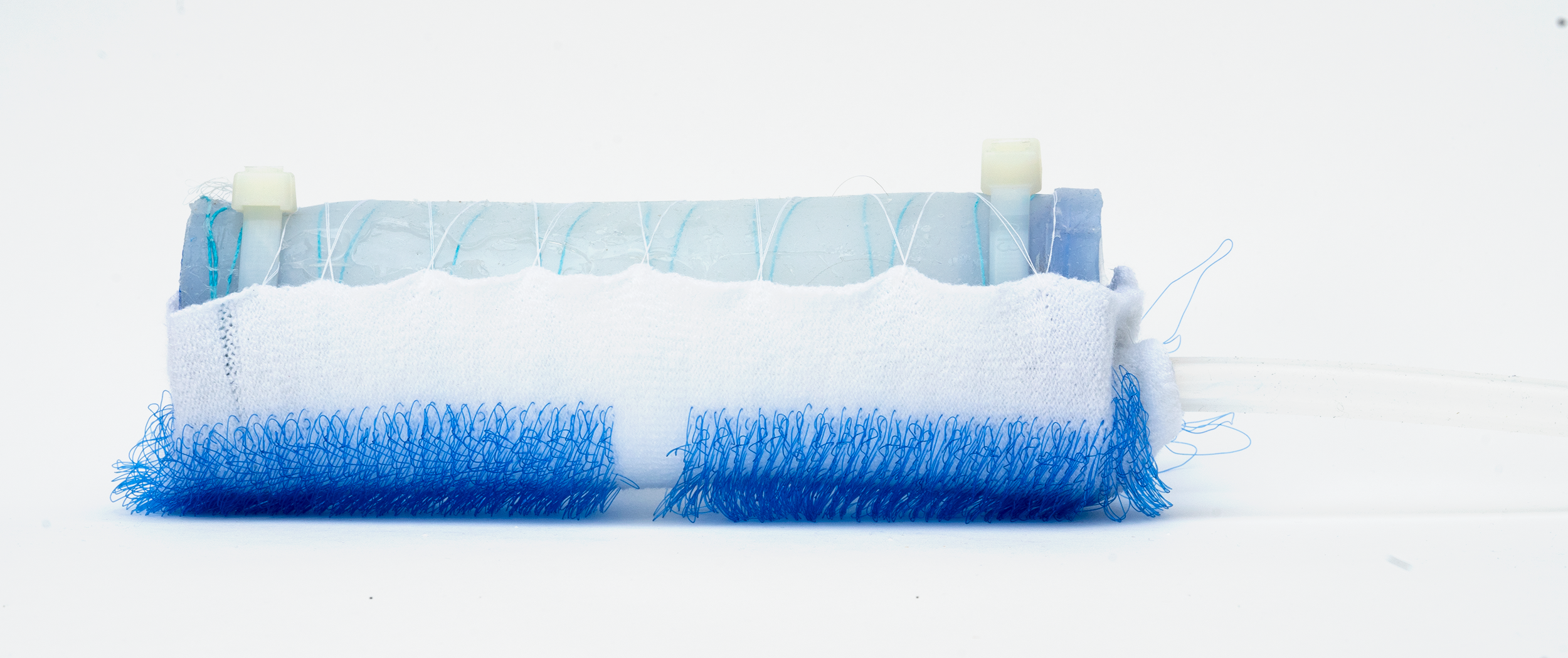 Bristles cladding a soft caterpillar robot.